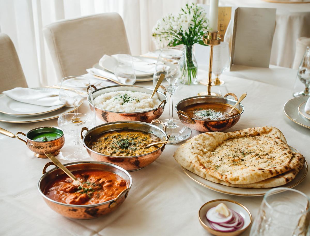 Indian dishes served at an elegant event table